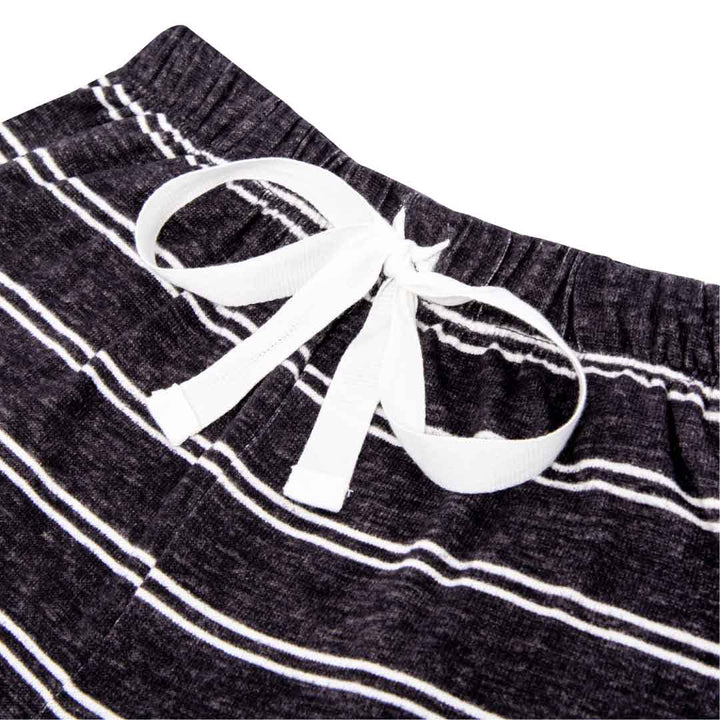 Close up view of the Black Stripes patterned pants drawstring as part of the 2 Pack René Rofé Lightweight Hacci Jogger Pajama Pants in Black Leopard and Black Stripes pattern