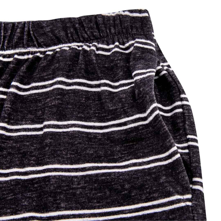 Close up view of the Black Stripes patterned pants pocket as part of the 2 Pack René Rofé Lightweight Hacci Jogger Pajama Pants in Black Leopard and Black Stripes pattern