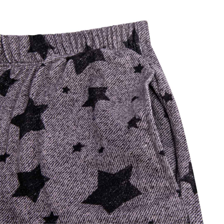 Close up view of the Grey Stars patterned pants pocket as part of the 2 Pack René Rofé Lightweight Hacci Jogger Pajama Pants in Grey Stars and Black Camo pattern